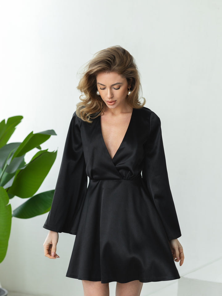 black satin mini dress with plunging v-neck and bell sleeves for cocktail party