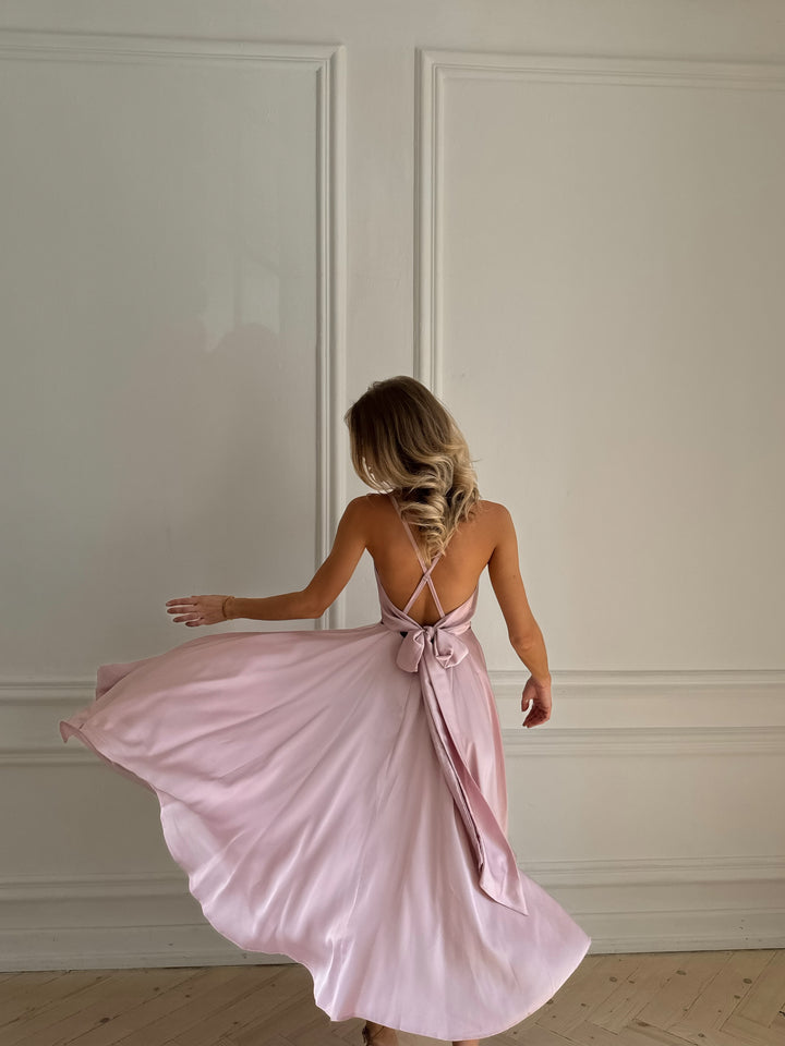 Light pink satin open back slip dress — fabric close up