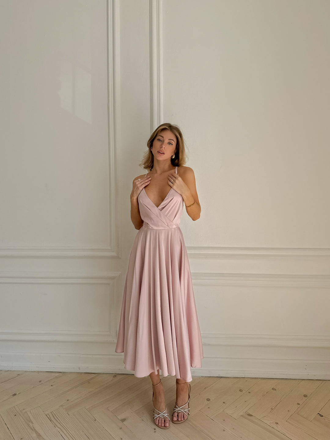 Blush pink silk satin midi dress — silhouette and drape close up