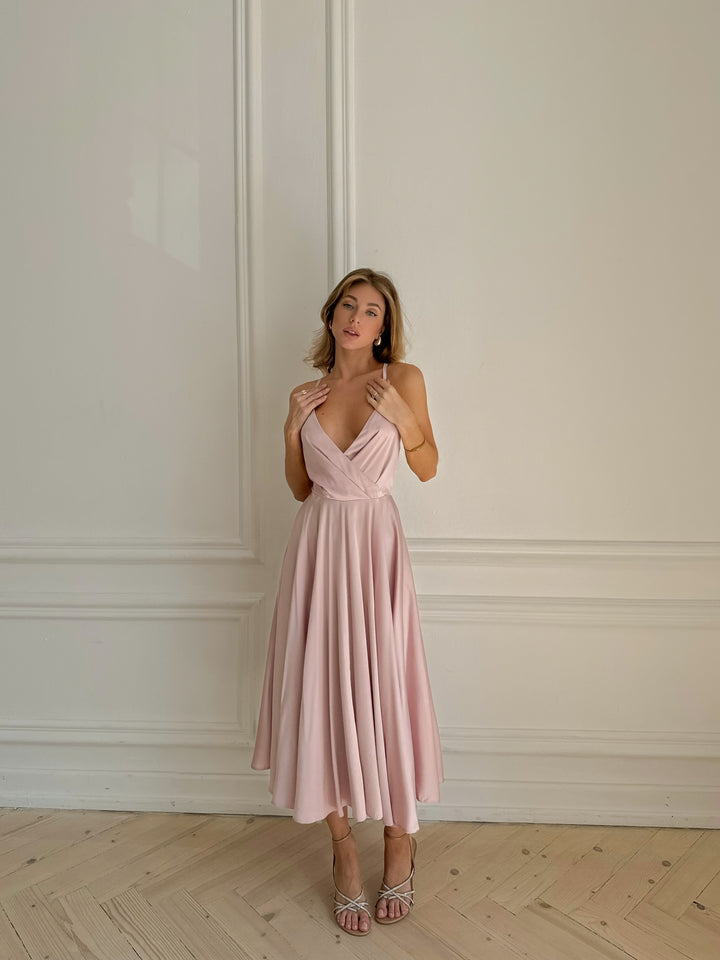 Blush pink silk satin midi dress — silhouette and drape close up