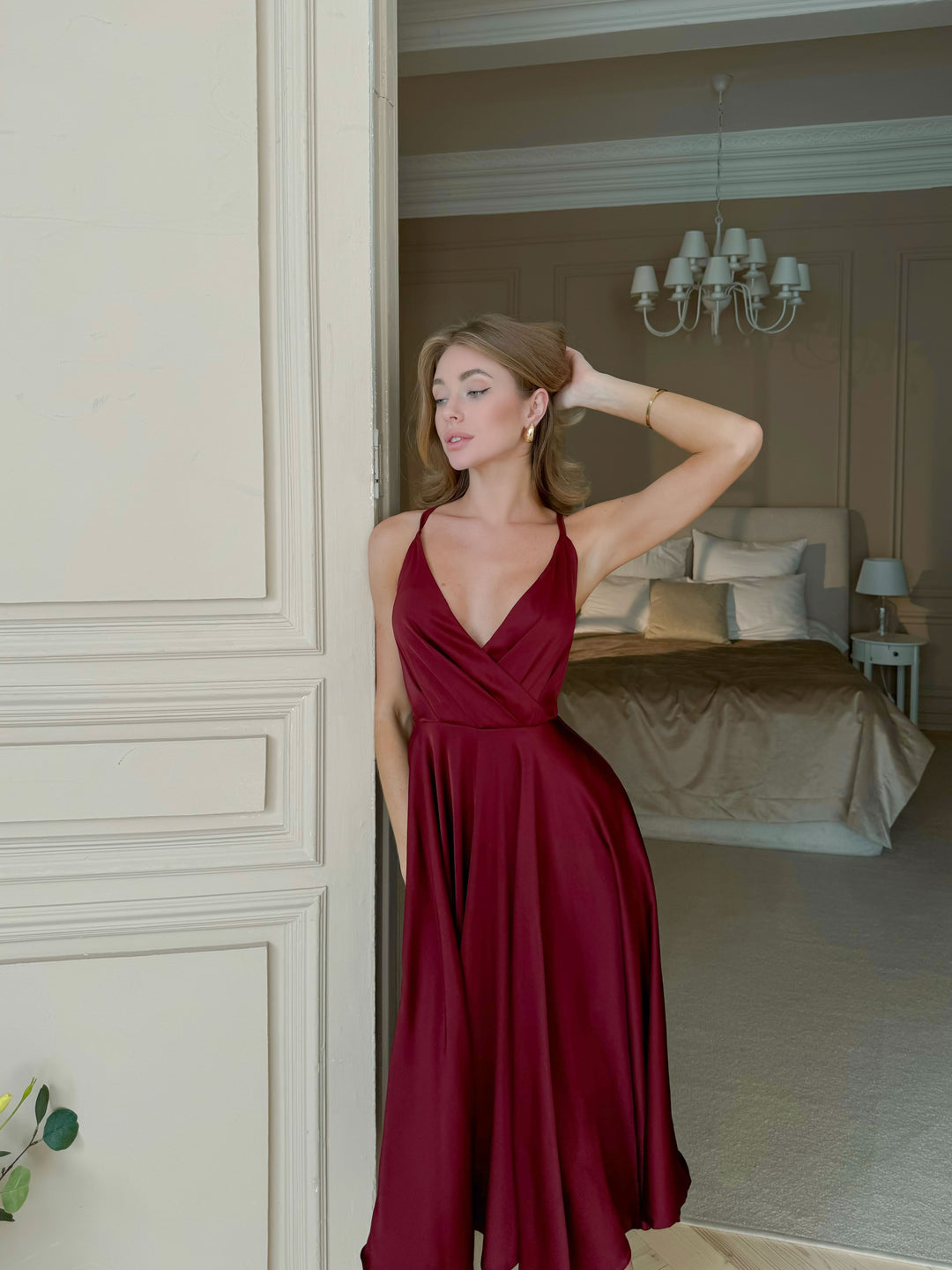 Burgundy silk slip midi dress with deep V-neck and flared midi skirt — ideal for formal dinners, winter weddings or cocktail events