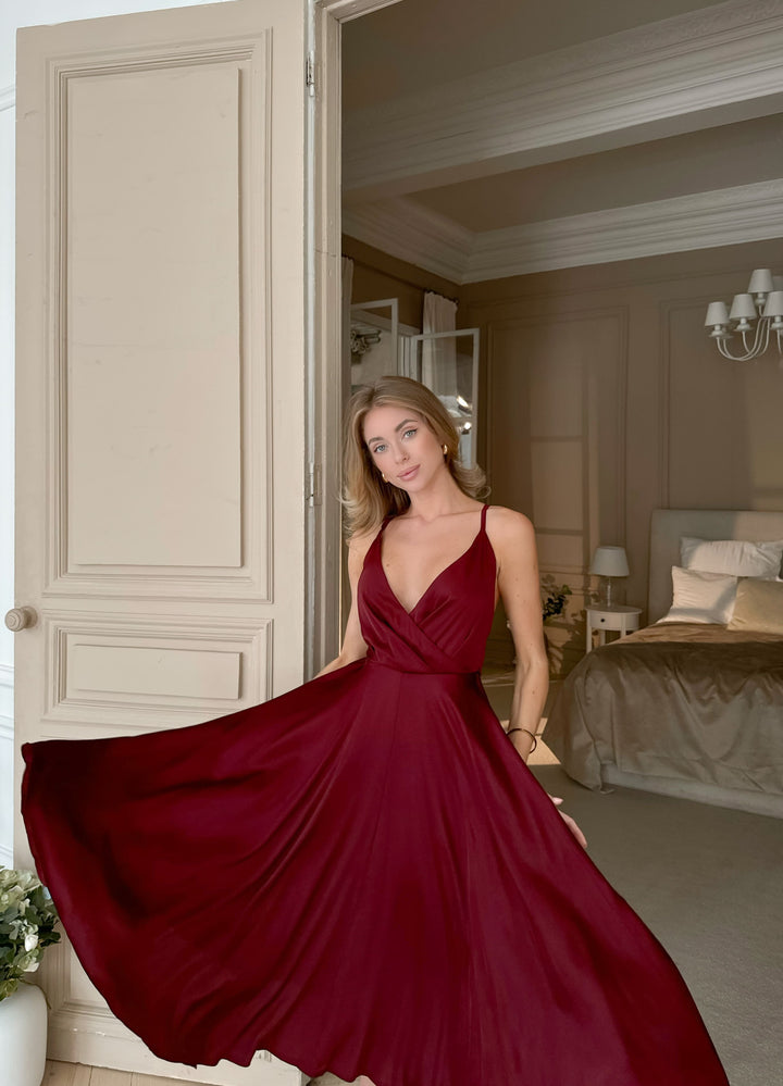 Burgundy satin slip midi dress with deep V-neck — elegant cocktail party or date night look