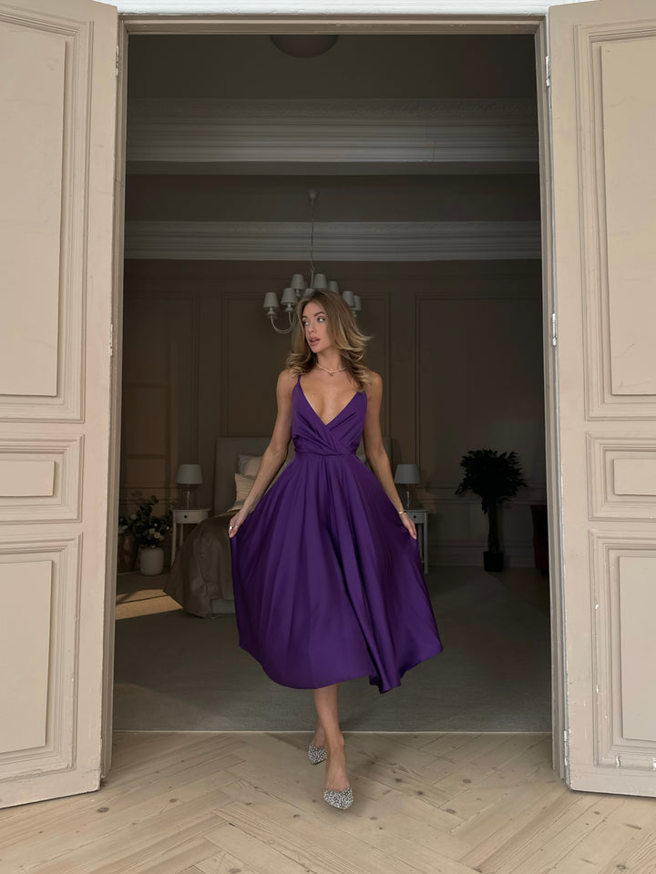 Deep purple silk slip dress with adjustable shoulder straps — close up