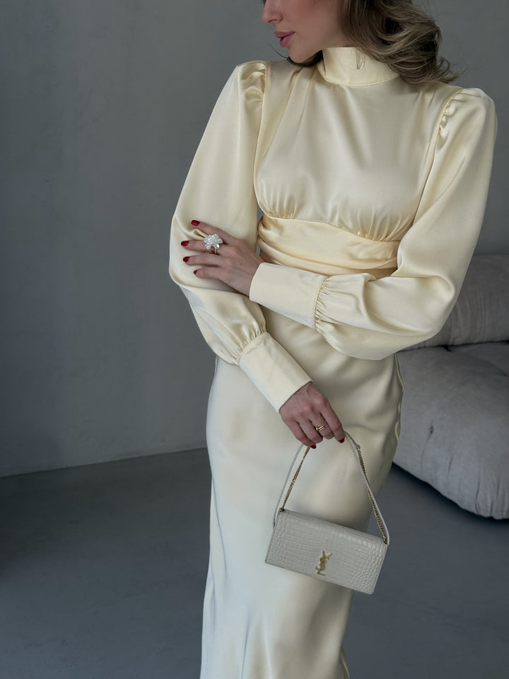 front view of a vibrant butter yellow silk blend midi dress designed for formal events and evening gatherings