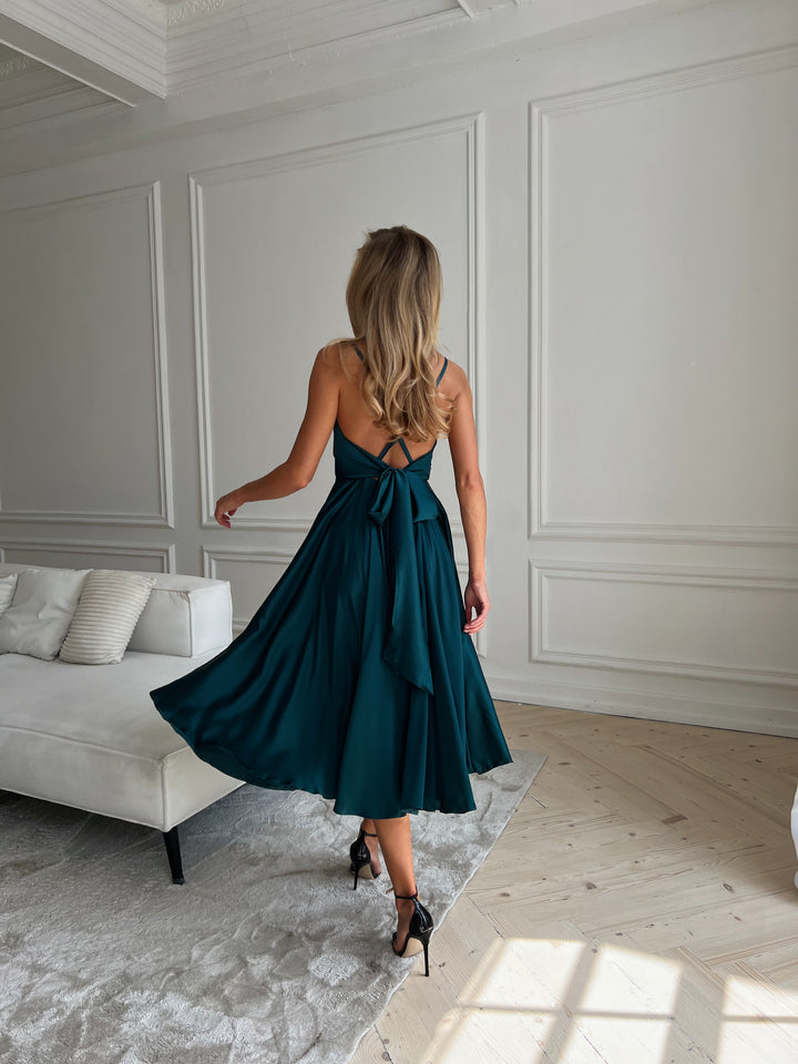 Dark green silk slip dress with elegant open back detail