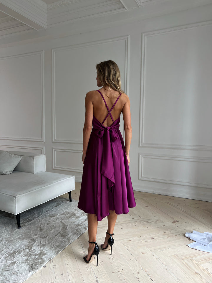 Bright fuchsia silk midi dress for bridesmaids or birthday celebration