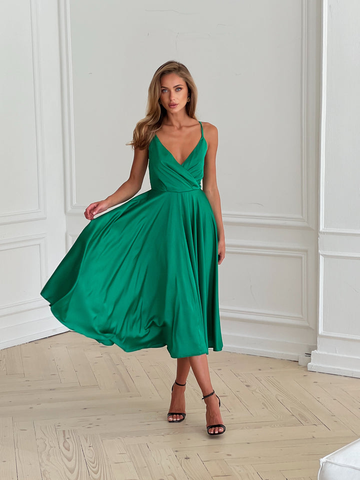 Grass green silk slip midi dress with deep V-neck and open back — front view