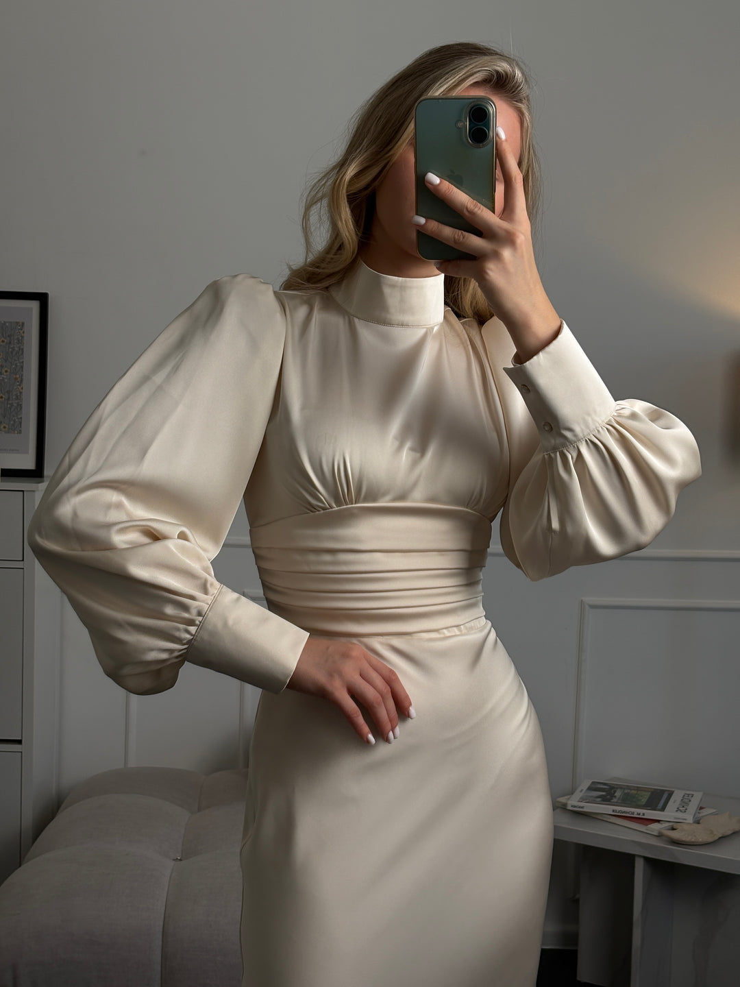 Modest ivory satin midi dress with long sleeves and bow neckline, perfect wedding guest or civil ceremony outfit for modern brides