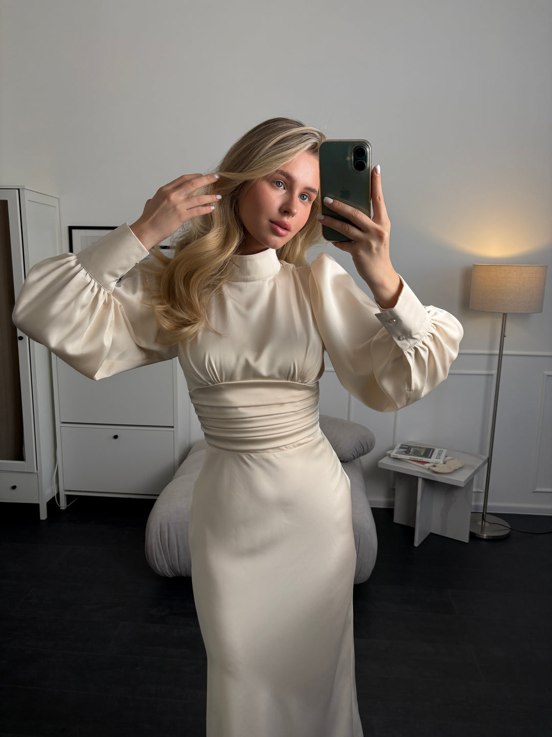 Minimalist ivory satin midi dress with long sleeves and bow neckline, perfect for civil wedding, elopement, or elegant event look