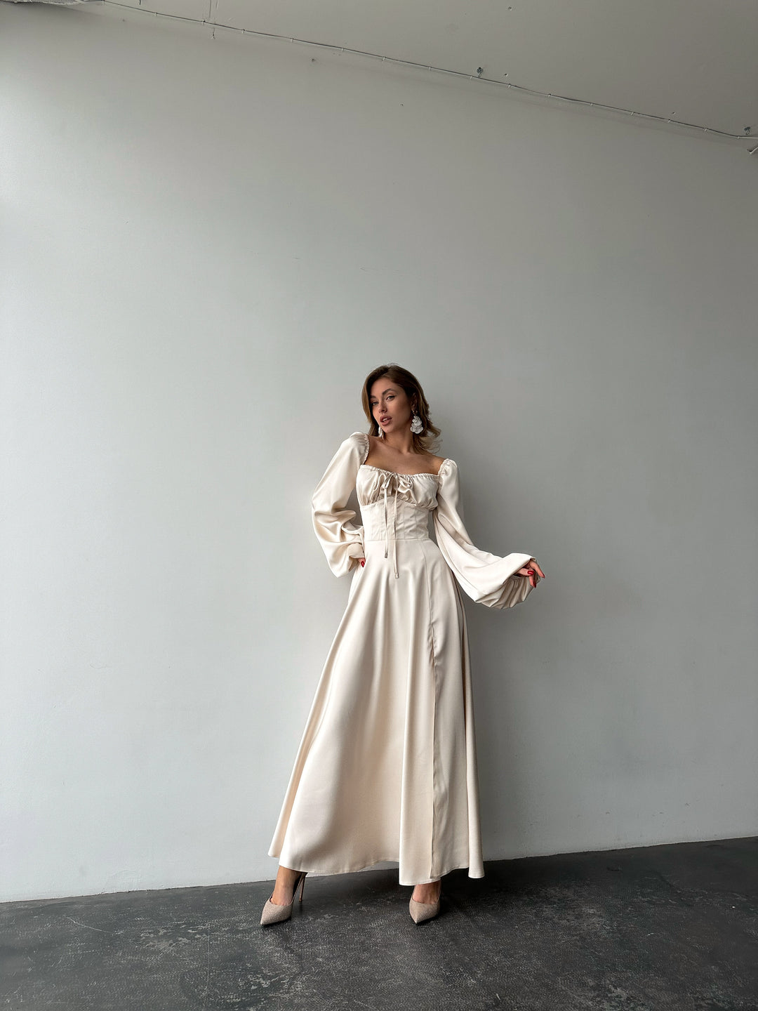 Ivory silk satin maxi dress front full-length view — sweetheart neckline with lace-up detail, bishop sleeves, floor-length flowing skirt. Perfect for civil weddings, bridal wear, elopements, and formal galas.
