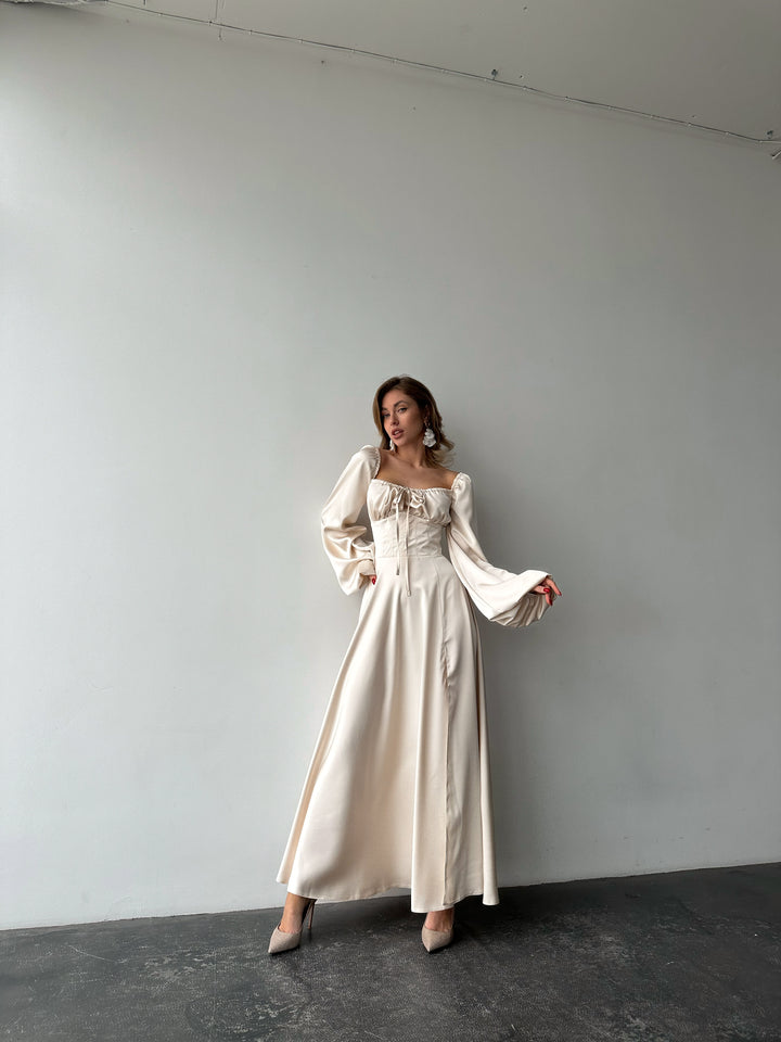 Ivory silk satin maxi dress front full-length view — sweetheart neckline with lace-up detail, bishop sleeves, floor-length flowing skirt. Perfect for civil weddings, bridal wear, elopements, and formal galas.