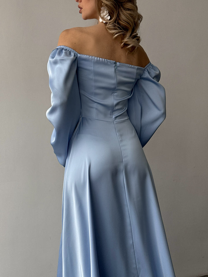 Pastel light blue long-sleeve evening dress made of smooth satin. Features a structured sweetheart bust and side slit, ideal for a formal event or gala.