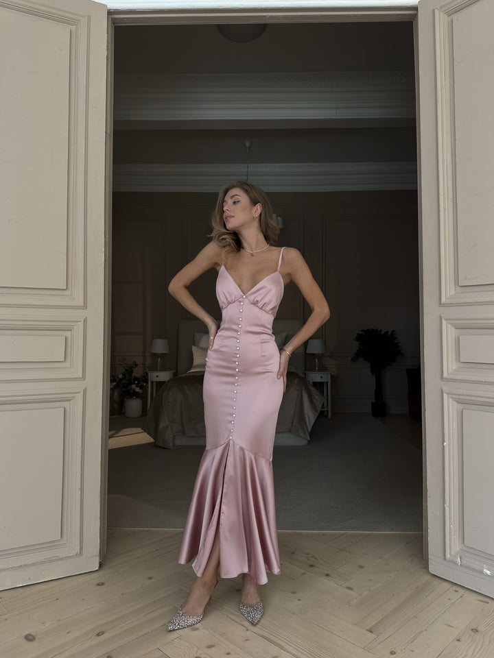 Light pink silk satin midi dress with pearl button front and mermaid skirt — front view