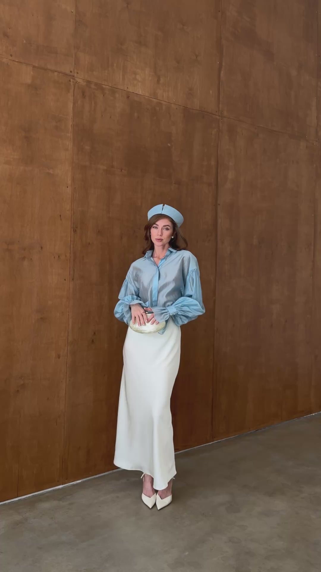 Ivory satin bias cut midi skirt with fluid drape modelled in motion — EvolveUA