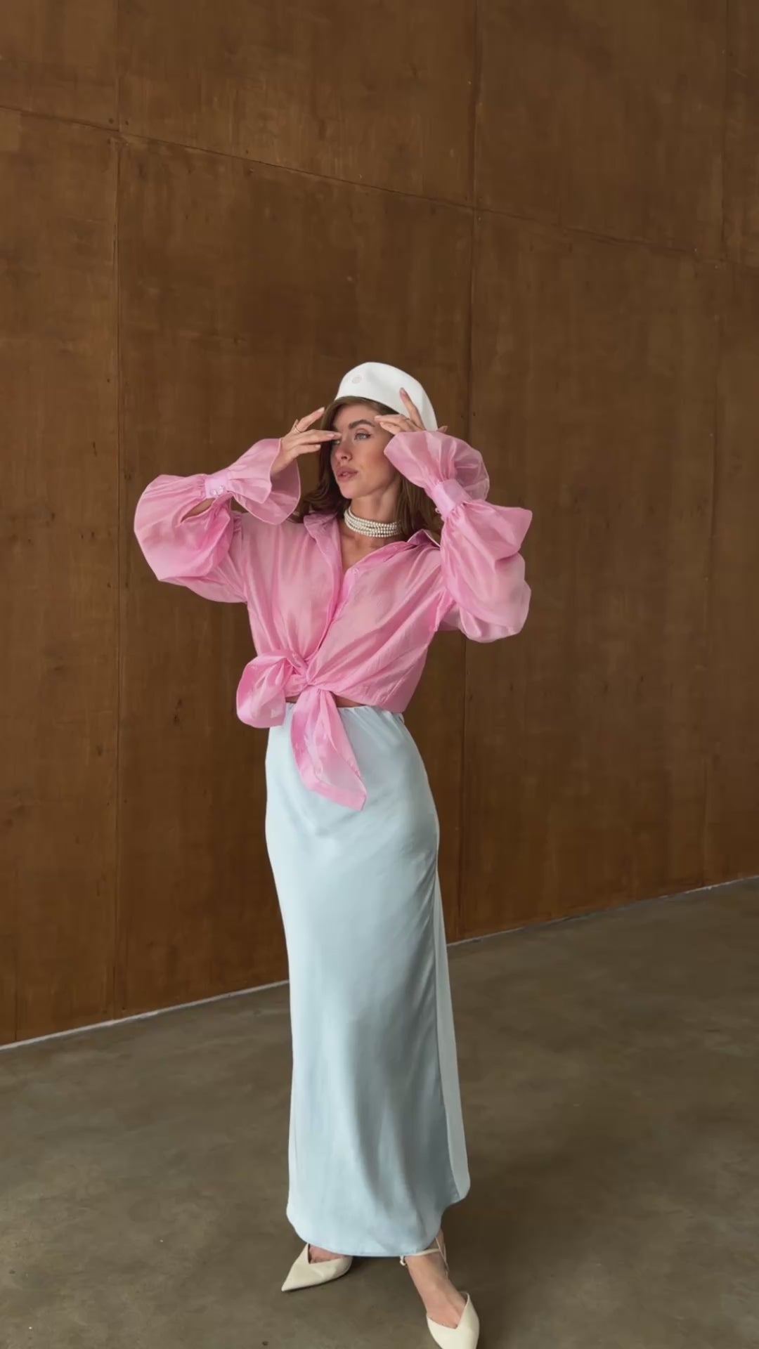 Ice blue satin bias cut midi skirt with fluid drape modelled in motion — EvolveUA