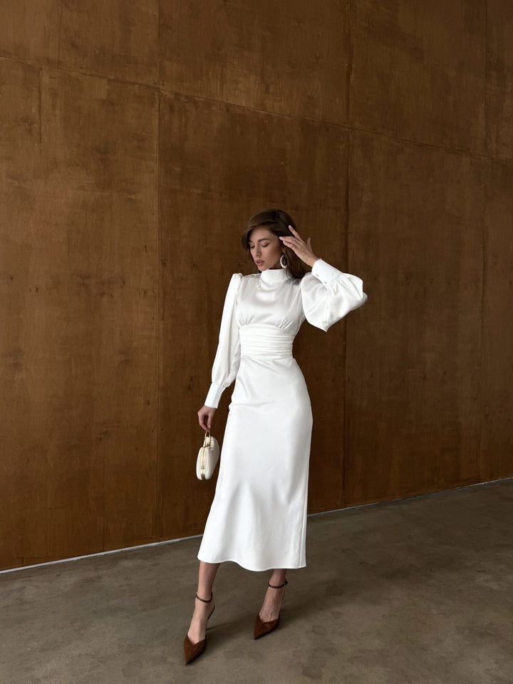 White satin midi dress with ruched empire waist and high neckline — elopement styling